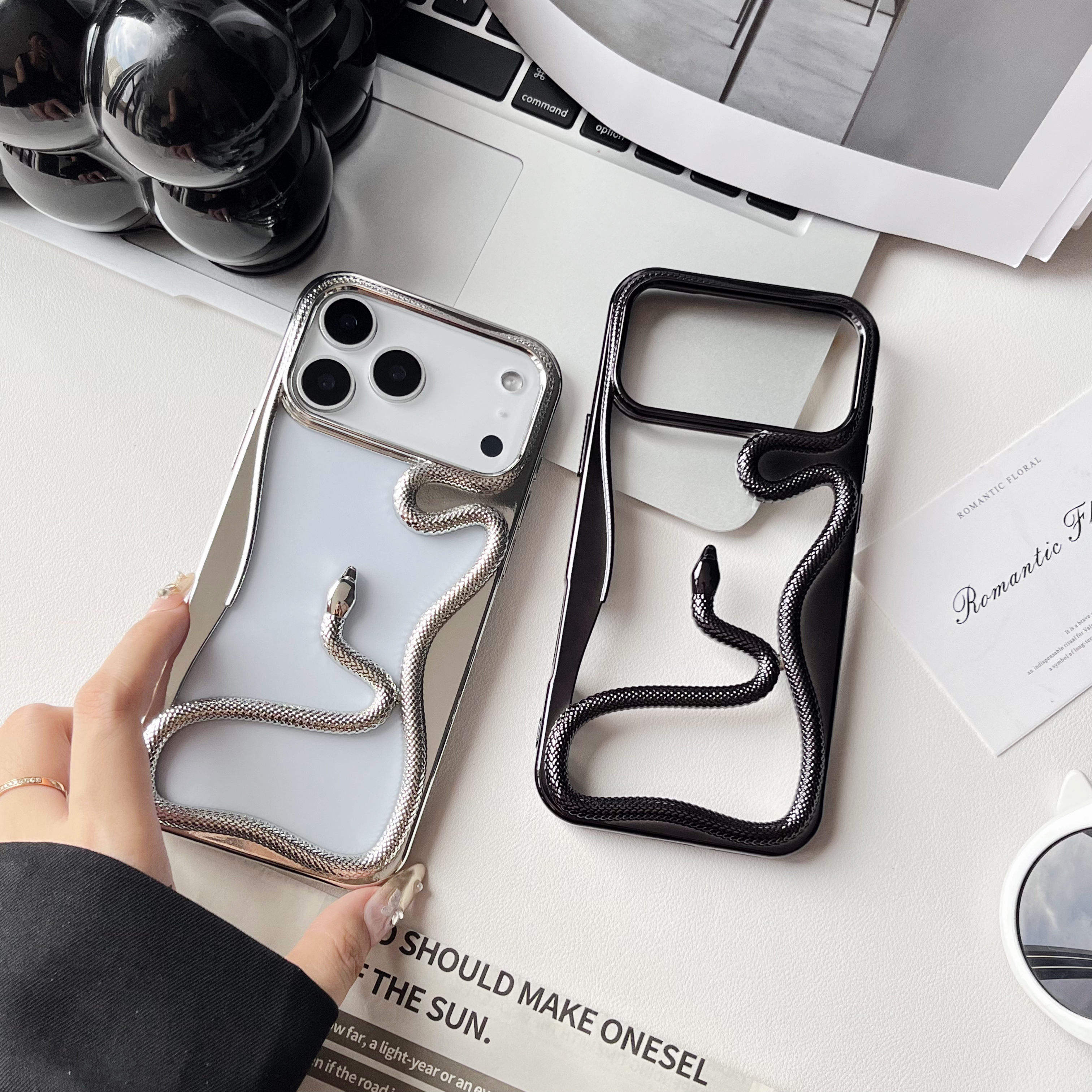 3D Snake Hollow Cooling Electroplated Phone Case.